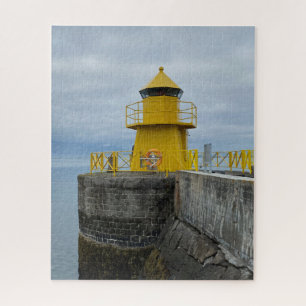Puzzle Pequeño faro amarillo en Reykjavik, Islandia