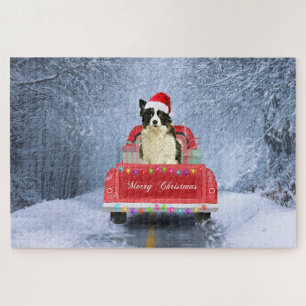 Puzzle Perro collie fronterizo en nieve sentado en Navida