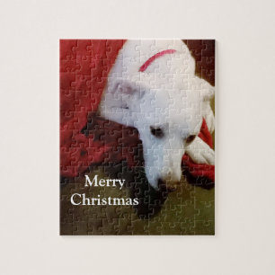 Puzzle Perro picante blanco y nevado con Navidades en man