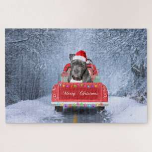 Puzzle Perro Pit Bull en la nieve sentado en un camión de