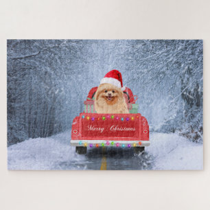 Puzzle Perro Pomerania en la nieve sentado en camión de N