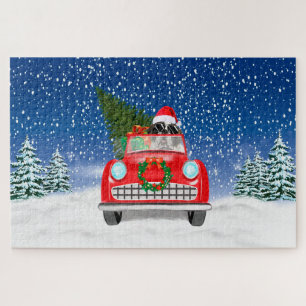 Puzzle Perro San Bernardo conduciendo coche en la nieve N