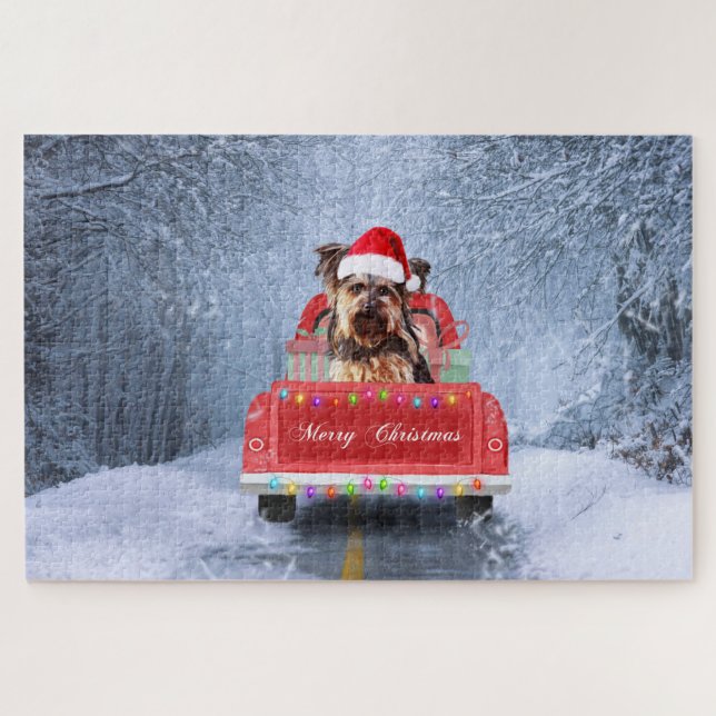 Puzzle Perro Terrier de Yorkshire en la nieve sentado en  (Horizontal)