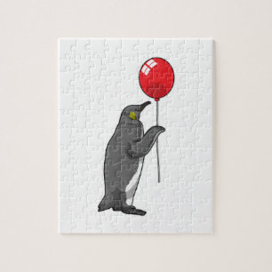 Puzzle Pingüino con globo