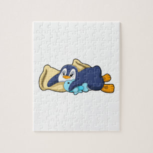Puzzle Pingüino durmiendo con almohada