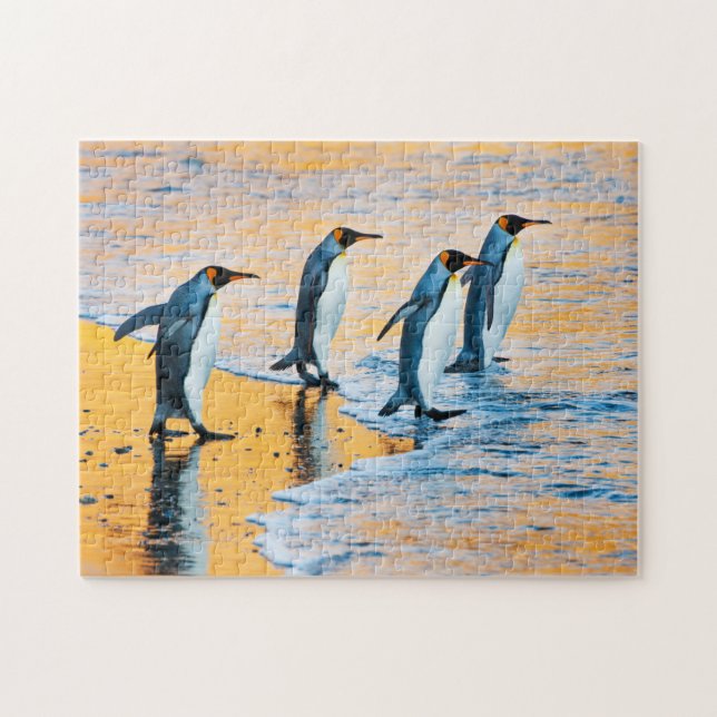 Puzzle Pingüinos de rey en la salida del sol (Horizontal)