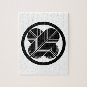 Puzzle Plumas de halcón que se cruzan con pie en círculo