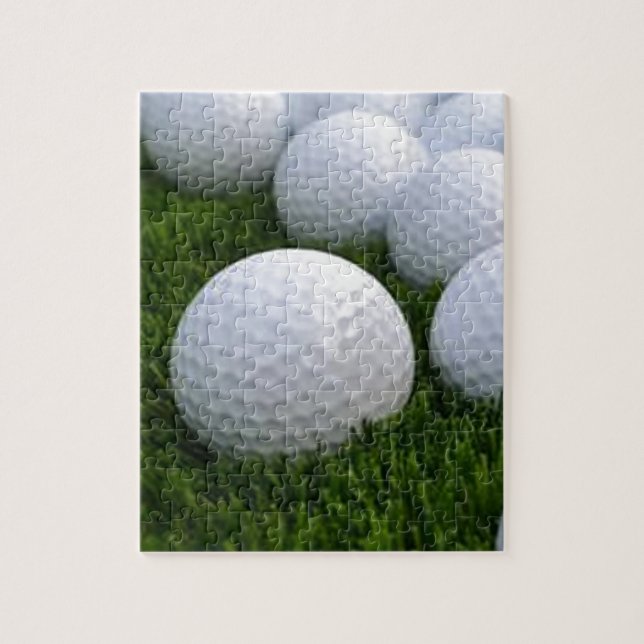 Puzzle Porciones de pelotas de golf en la hierba (Vertical)