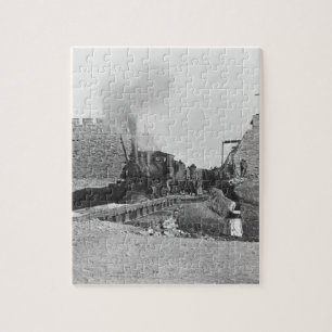 Puzzle Primer tren que pasa a través de la pared de