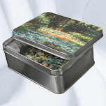 Puzzle Puente sobre el estanque acuático de Claude Monet<br><div class="desc">El Puente sobre el estanque de lirio acuático (1900) de Claude Monet es un bonito cuadro de arte floral de estilo imponente vintage. Forma parte de una serie de pinturas de pasarelas japonesas que Monet pintó en sus jardines de flores de primavera en Giverny, Francia. Sobre el artista: Claude Monet...</div>