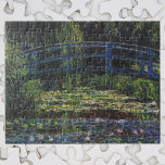 Puzzle Puente sobre estanque acuático por Claude Monet<br><div class="desc">Bridge Over Waterlily Pond de Claude Monet es un bonito cuadro de arte de estilo Art Nouveau de época que presenta una pasarela que cruza flores de lirio en un estanque en el jardín de Monet en su casa en Giverny, Francia. Hermosas flores flotan en el agua y los sauces...</div>
