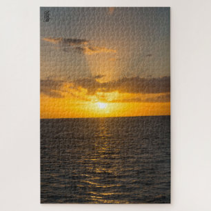 Puzzle Puesta de sol brillante en el océano