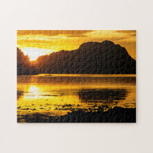 Puzzle Puesta de sol dorada sobre la bahía