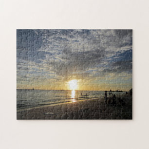 Puzzle puesta de sol en la playa blanca