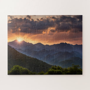 Puzzle Puesta de sol hermosa sobre las montañas