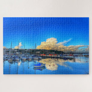 Puzzle Reflejos de Brixham: Nubes doradas y vista al puer