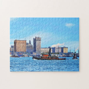 Puzzle Remolcadores cerca del horizonte de la ciudad de N