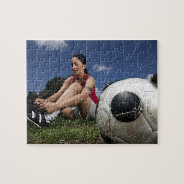 Puzzle retrato de una futbolista atándola (Horizontal)
