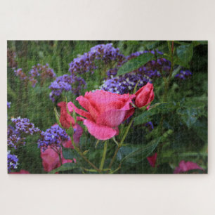 Puzzle Rosa rosa y estatua en el jardín