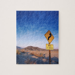 Puzzle Rótulo en el camino de Death Valley en puesta del