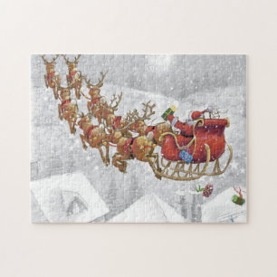 Puzzle Santa Claus en trineo con caja de regalo
