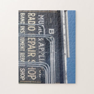 Puzzle signo comercial pintado de antaño