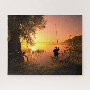Puzzle Silhouette de Fisherman en el lago al atardecer