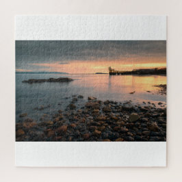 Puzzle Sunset de rock negro en la playa Salthill en Galwa