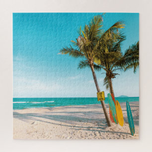 Puzzle Surf board en la playa tirando almohada