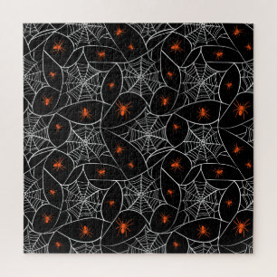 Puzzle telaraña de Halloween y fondo de arañas.