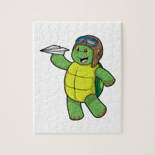 Puzzle Tortuga como piloto con plano de papel