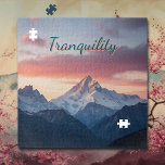 Puzzle Tranquilidad | Montañas y nubes<br><div class="desc">Bonito con vistas a un pico de montaña con nieve con hermosas nubes rosas y violetas con la palabra tranquilidad.</div>