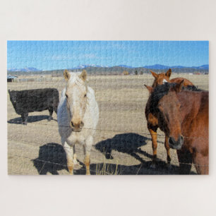 Puzzle Tres caballos y una vaca