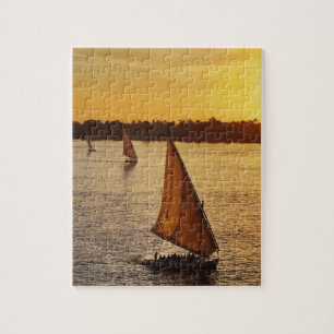 Puzzle Tres falukas con turistas en el río Nilo en