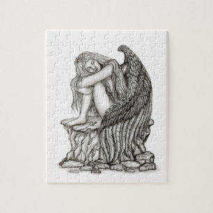 Puzzle Un ángel dormido en la piedra