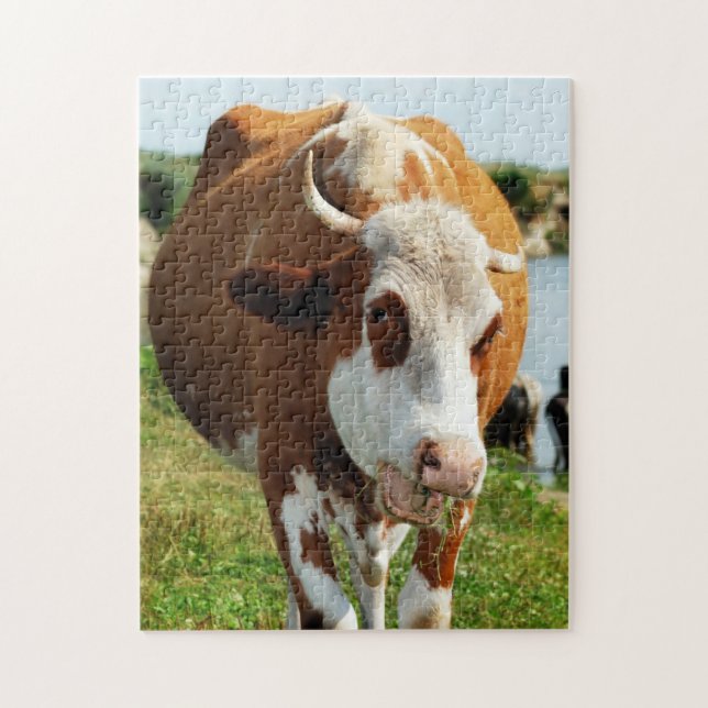 Puzzle Un animal gracioso de vaca canta (Vertical)