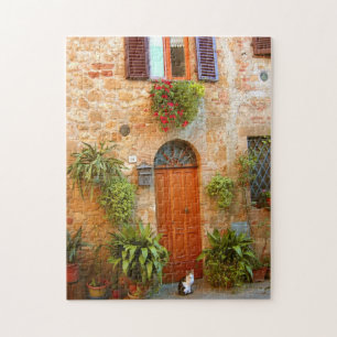 Puzzle Un gato busca entrada a casa en Pienza, Italia