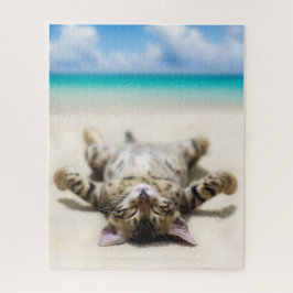 Puzzle Un gato tomando el sol en la playa