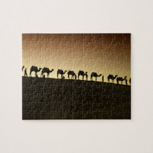 Puzzle Un grupo de pastores de camellos con sus camellos