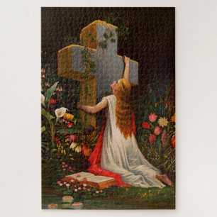 Puzzle Una mujer con una cruz está rezando