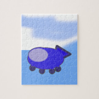 Puzzle Una nave espacial azul suave en las nubes azules f