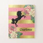 Puzzle Unicornio floral de oro y rosado con nombre<br><div class="desc">Este divertido rompecabezas presenta un bonito diseño ondulado con una silueta unicornio sobre un fondo de rayas rosadas y doradas con rosas vintage en las esquinas. Hay espacio para personalizarlo añadiendo su nombre. ¡Una actividad interior perfecta!</div>