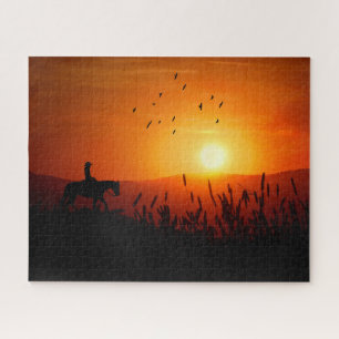 Puzzle Vaquera al Atardecer en un Paseo a Caballo por un