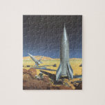 Puzzle Vintage Science Fiction Desert Planet con cohetes<br><div class="desc">Ilustracion vintage futurista en el espacio exterior y planetas ciencia ficción imagen del cohete. Un cohete de ciencia ficción de viajes y transporte retro en un planeta extranjero o una luna con astronautas explorando el terreno en este desconocido mundo extraterrestre. Un clásico de los años 50: el diseño de ciencia...</div>