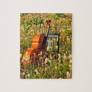 Puzzle Violoncelo con la silla en un campo de wildflowers