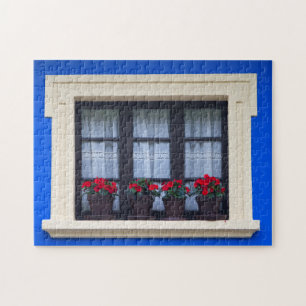 Puzzle Viviendas con flores en ventanas