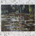 Puzzle Waterlilies en Pond por Claude Monet, arte vintage<br><div class="desc">El Waterlilies de Claude Monet es un bonito cuadro de arte natural con lirios en un estanque en el jardín de Monet, su casa en Giverny, Francia. Árboles de flores silvestres cuelgan sobre el agua y la pasarela japonesa está a lo lejos. Una serie de más de 250 pinturas con...</div>