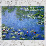Puzzle Waterlilies por Claude Monet, Bella Artes de la ép<br><div class="desc">El Waterlilies de Claude Monet es un bonito cuadro de arte natural con lirios en un estanque en el jardín de Monet, su casa en Giverny, Francia. Un día soleado de primavera o verano con el cielo azul brillante reflejando en el estanque. Claude Monet disfrutó pintando "al aire libre" o...</div>