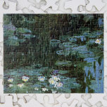 Puzzle Waterlilies por Claude Monet, Bella Artes de la ép<br><div class="desc">El Waterlilies de Claude Monet es un bonito cuadro de arte natural con lirios en un estanque en el jardín de Monet, su casa en Giverny, Francia. Los llorosos sauces emiten una reflexión en el estanque. Claude Monet disfrutó pintando "al aire libre" o "al aire libre". Una serie de más...</div>