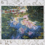 Puzzle Waterlilies por Claude Monet, Bella Artes de la ép<br><div class="desc">El Waterlilies de Claude Monet es un bonito cuadro de arte natural con lirios en un estanque en el jardín de Monet, su casa en Giverny, Francia. El verde profundo de los sauces llorosos está proyectando un reflejo en el estanque. Claude Monet disfrutó pintando "al aire libre" o "al aire...</div>